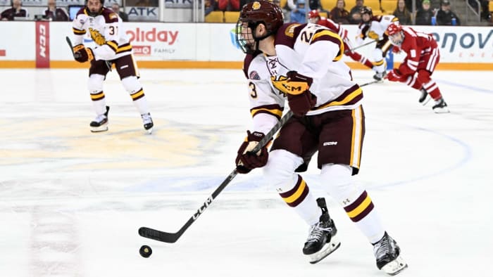 Defenseman Will Francis skates with the puck.